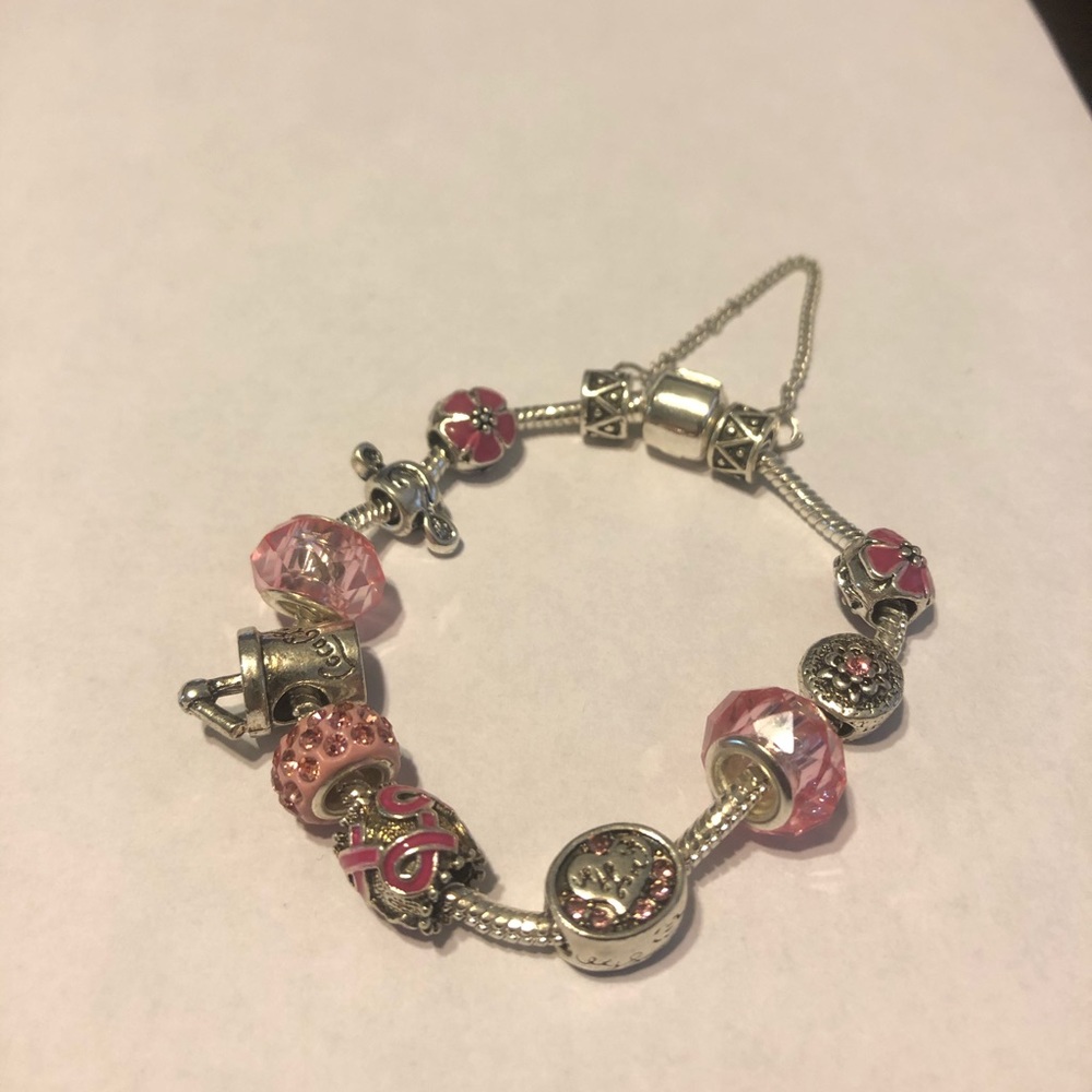 Silver charmed brackets